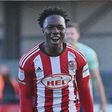 Kenyan international Vincent Harper on target as Exeter City share spoils in League One