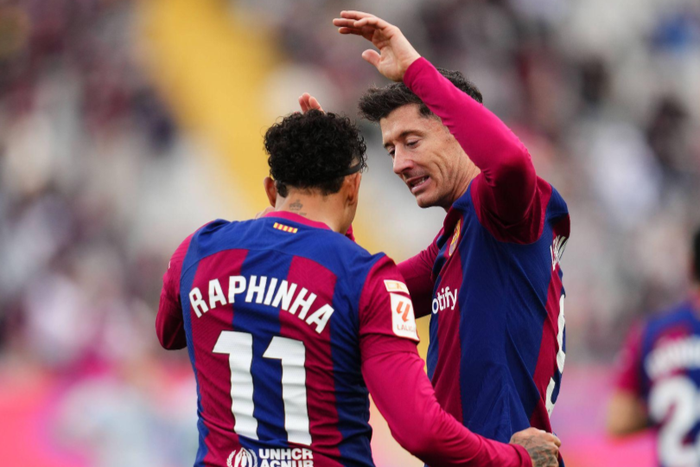 Raphinha and Lewandowski celebrating a goal against Getafe || Image credit: Imago