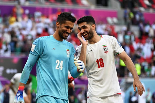 Iran players celebrate past win