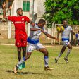 Shabana FC players vying for the ball with Coastal Heroes players