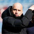 Manchester City manager Pep Guardiola (left) and Joao Cancelo || Image credit: Imago