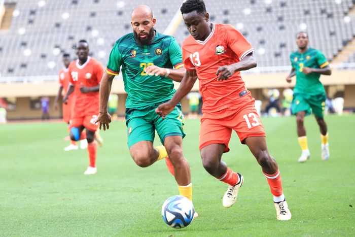 Erick Marcelo takes on Cameroon's Brayan Mbeumo in previous fixture for Harambee Stars.