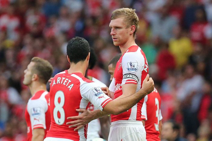 Former Arsenal players Mikel Arteta and Per Mertesacker.