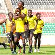 Tusker FC players celebrate goal in FKF PL action.