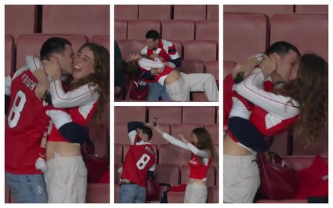 Love in the air: Arsenal couple danced and kissed to celebrate the Gunners' humiliation of Chelsea.