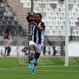 PAOK striker Esse Akida celebrating a goal.