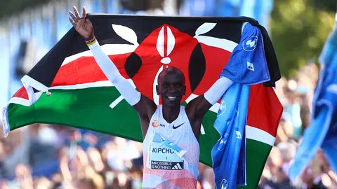 Eliud Kipchoge claims fifth race win as Tigist Assefa breaks women's record