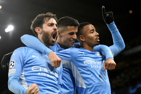 Man City take top spot, PSG through despite defeat