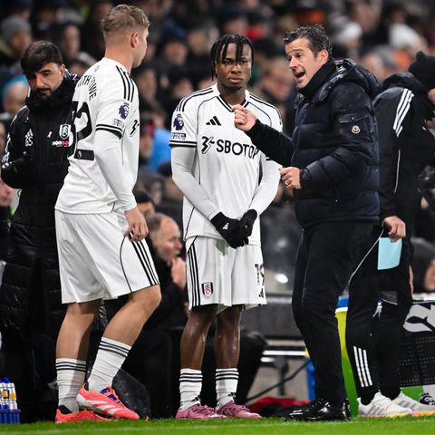 Chukwueze and his coach before he was introdued in the game.