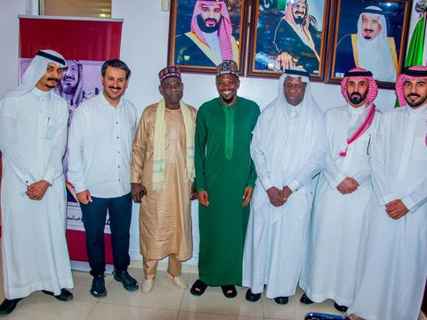 In Kano, Super Eagles captain Ahmed Musa gifts a Nigerian jersey to the Saudi Arabia Consul.