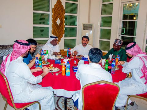 In Kano, Super Eagles captain Ahmed Musa gifts a Nigerian jersey to the Saudi Arabia Consul.