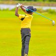 A junior golfer in action.