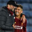 Liverpool's Firmino and Jurgen Klopp