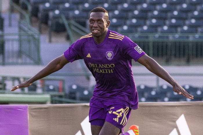 Kenyan defender Nabi Kibunguchy celebrating.