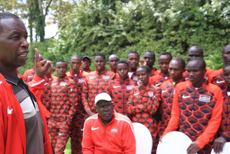 Coach Robert Ngisirei addressing the juniors with the officials.