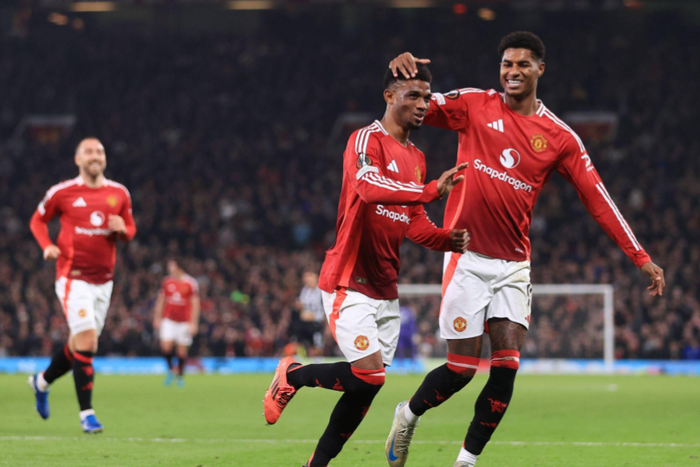 mad Diallo of Manchester United (C) celebrates with Marcus Rashford of Manchester United after scoring their 2nd goal - Photo: Simon Stacpoole Offside.
