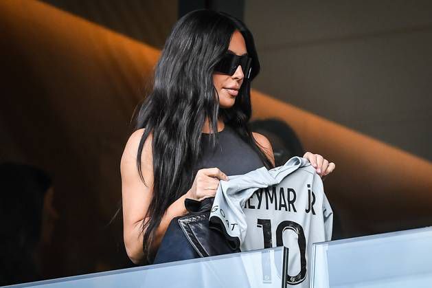 Kim Kardashian with a Neymar Jersey at a PSG match