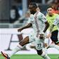 Nigerian striker David Okereke celebrates Cremonese stunning AC Milan at San Siro.