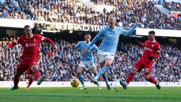 Liverpool deny Manchester City as Haaland makes Premier League history