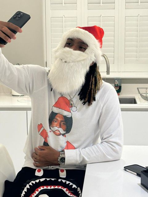 Alex Iwobi taking a selfie in his costume.