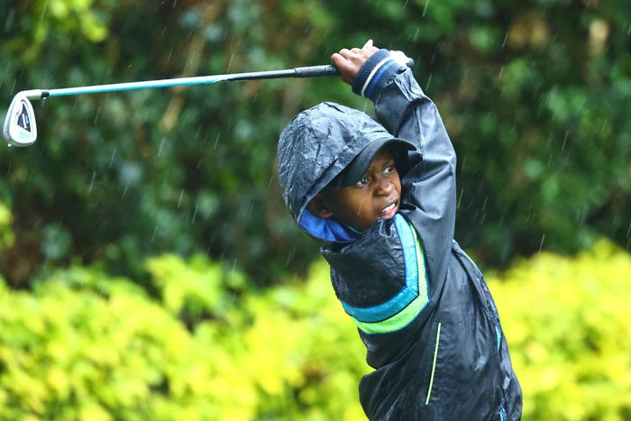 A junior golfer in action