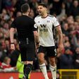 Fulham striker Aleksandar Mitrovic argues with the referee during the FA Cup against Manchester United Old Trafford.
