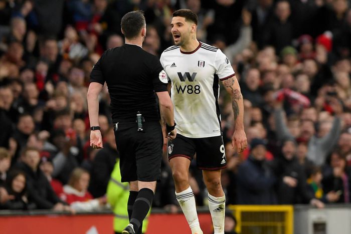 Fulham striker Aleksandar Mitrovic argues with the referee during the FA Cup against Manchester United Old Trafford.