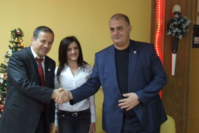 Albanian Athletics Federation's president Gjergj Ruli on the right