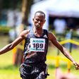 Isaiah Lasoi celebrates while crossing 10km senior men on December 17th during Athletics Kenya Prisons National Cross Country championship at Prisons Staff Training College.