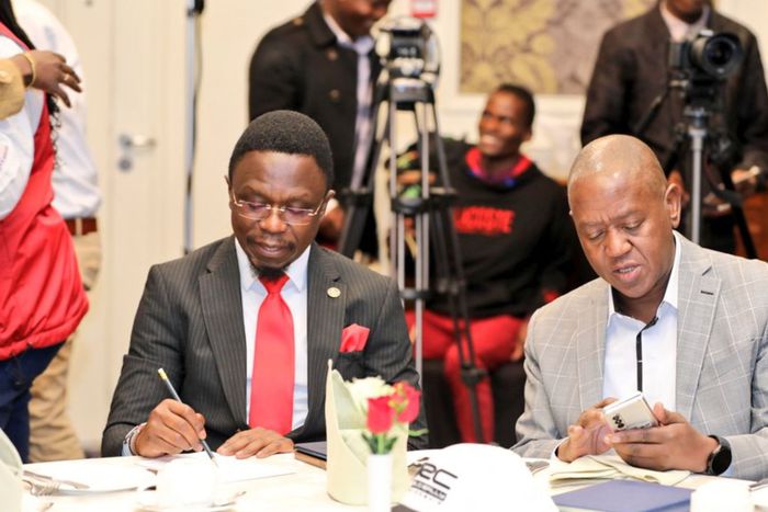 Sports CS Ababu Namwamba (L) and WRC Safari Rally Phineas Kimathi (R)