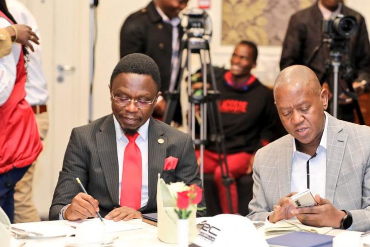 Sports CS Ababu Namwamba (L) and WRC Safari Rally Phineas Kimathi (R)