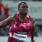 Christian Coleman reacts after narrowly edging out Kenya's Ferdinand Omanyala at Prefontaine Classic