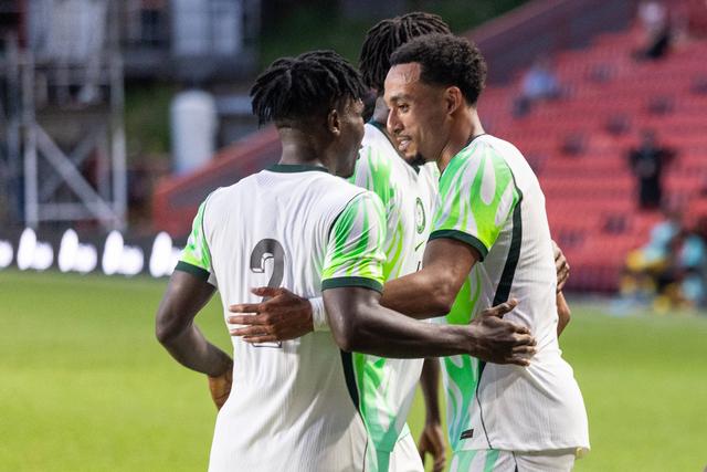 Super Eagles players celebrating their win against Jamaica || Imago