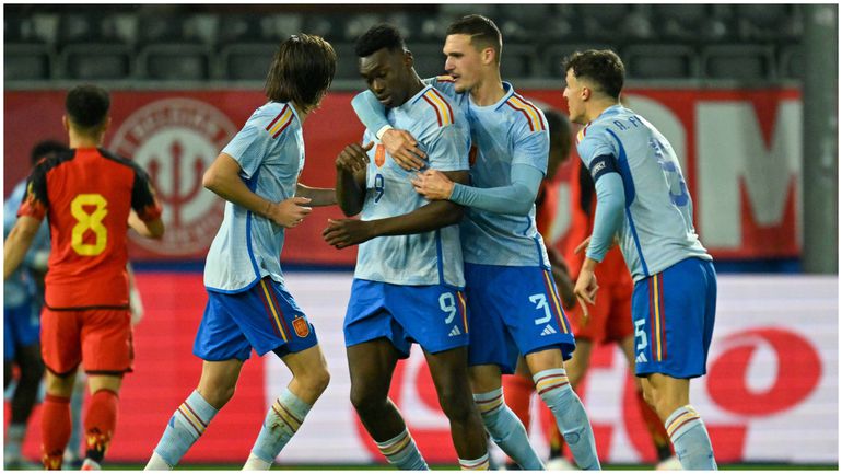Samuel Omorodion celebrates with his Spanish teammates.