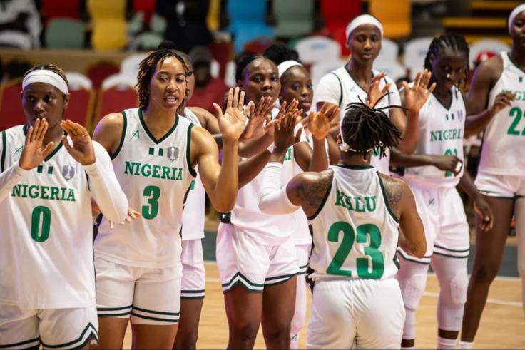 Defending champions Nigeria's D'Tigress make a statement with a 92-45 win against Rwanda to start 2025 AfroBasket. - FIBA