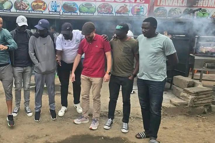Gambia Coach Spotted Enjoying Nyama Choma in Kenya Ahead of Harambee Stars Showdown in Kasarani