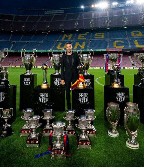 Sergio Busquets posing with his Barcelona trophies || Image credit: iMAGO