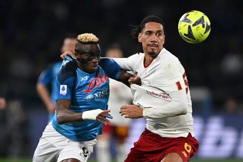 Osimhen in action against Roma defender Chris Smalling