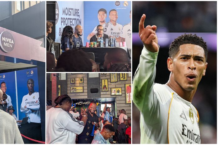 A crowded photo of football fans wearing Real Madrid and Barcelona jerseys, cheering loudly and blowing vuvuzelas at the NIVEA El Clásico watch party in Lagos.