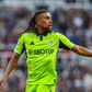 Alex Iwobi wearing a Fulham kit during the game against Newcastle United.