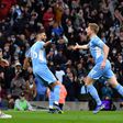 Leaders Man City hit six after Leicester scare