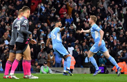 Leaders Man City hit six after Leicester scare