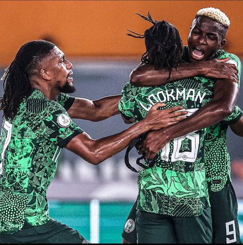 Victor Osimhen and Alex Iwobi celebrate with match-winner, Ademola Lookman.