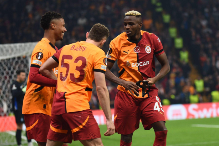 Victor Osimhen (45) of Galatasaray celebrates after scoring the third goal of his team with teammates during the UEFA Europa League 2024 25 League Phase MD7 match between Galatasaray A.S. and FC Dynamo Kyiv (Photo by Seskimphoto )