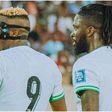 Victor Osimhen and Tea during the game in Uyo against Zimbabwe.