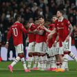 Manchester United players celebrating.