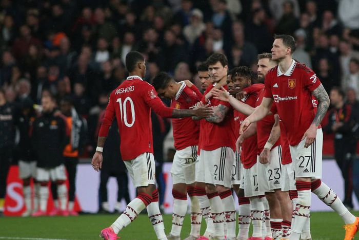 Manchester United players celebrating.