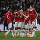 Manchester United players celebrating.