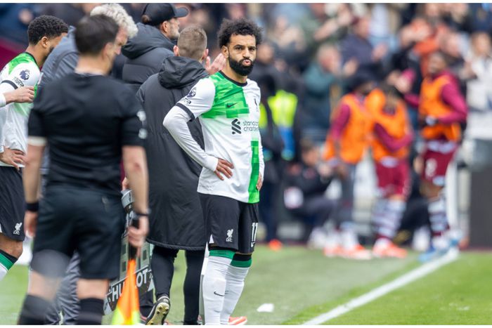 MO Salah looks dejected on the touchline against West Ham.