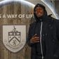 Why Usain Bolt took a picture infront of Burnley's logo despite being a Manchester United fan